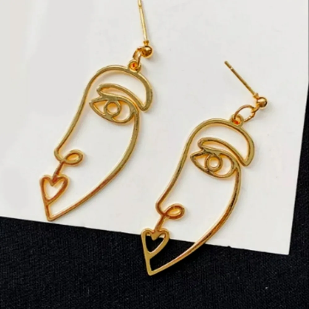 Gold Abstract Cut Out Face Earrings - Picture 1 of 4